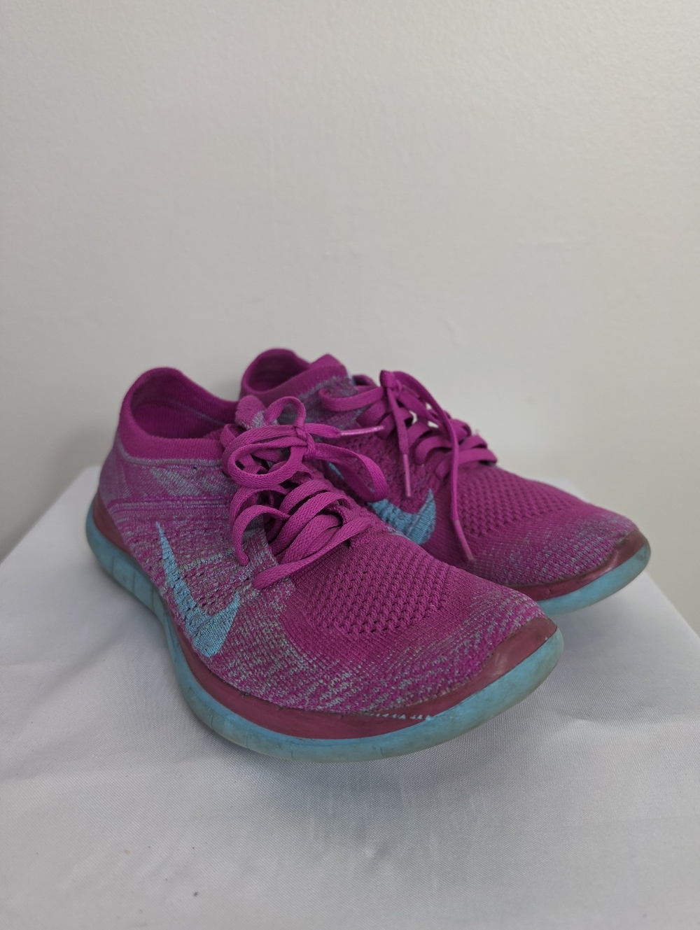 Nike Women's Pink Flyknit Running Shoes
